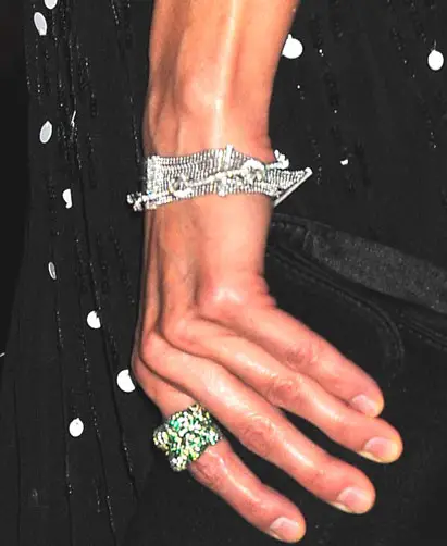 Queen Letizia wide mesh-style bracelet paired with a knotted chain bracelet