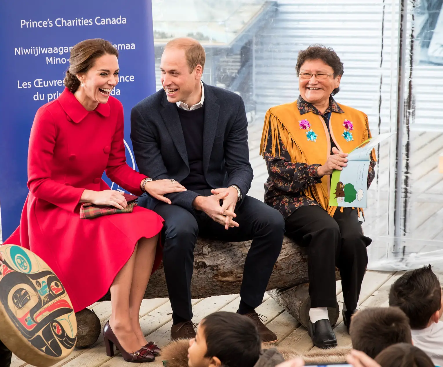 Duchess of Cambridge wore Red Carolina Herrera Coat and Tod's fringe pumps in Canada in 2016