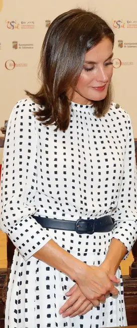 Queen Letizia topped the Massimo Dutti dress with black belt