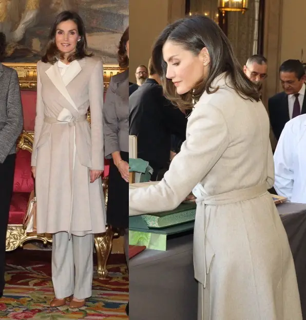 Queen Letizia wore Carolina Herrera stone double-face wool coat at SEPE comemmoration