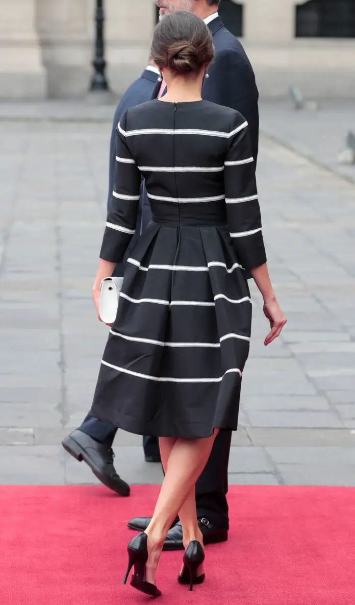 Queen Letizia of Spain wore Carolina Herrera Crochet-trimmed pleated silk-faille dress