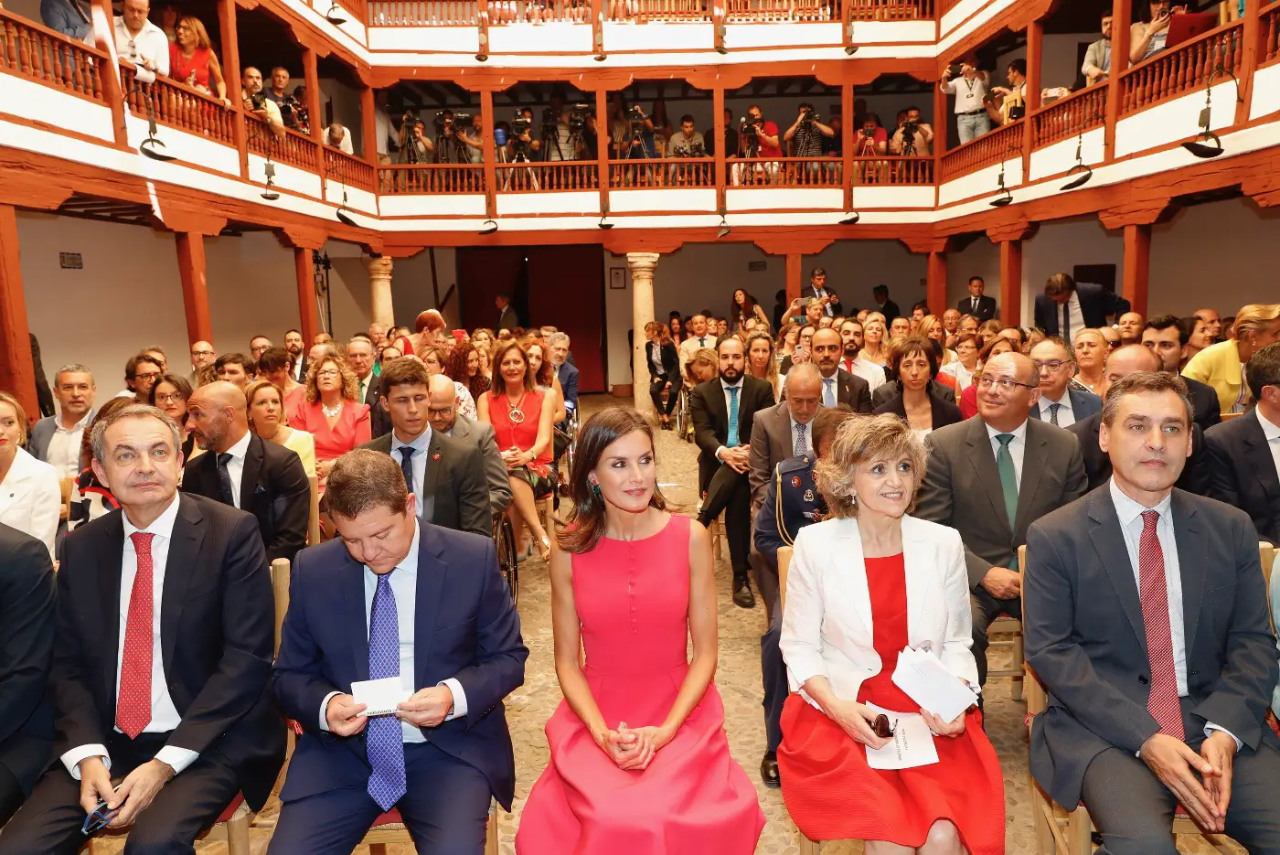 Queen Letizia in fuchsia Carolina Herrera dress and Steve Madden pumps