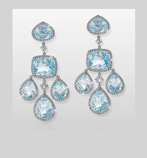 Queen Letizia wore Yanes blue topaz chandelier earrings