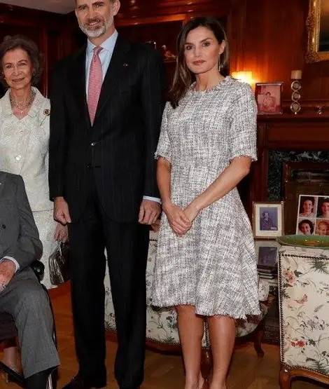 Queen Letizia chose a grey Adolfo Dominguez tweed dress.