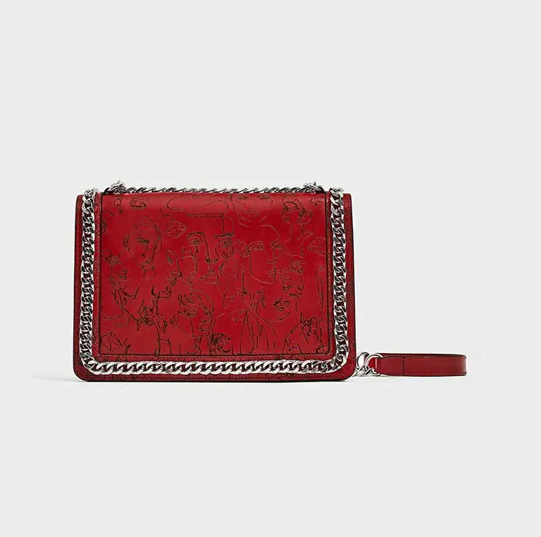 Queen Letizia carried Zara red sling bag