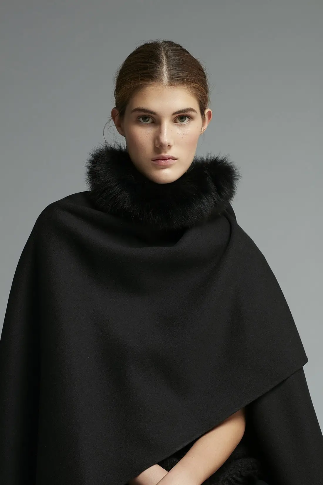 Queen Letizia of Spain wore Carolina Herrera black fur neck cape