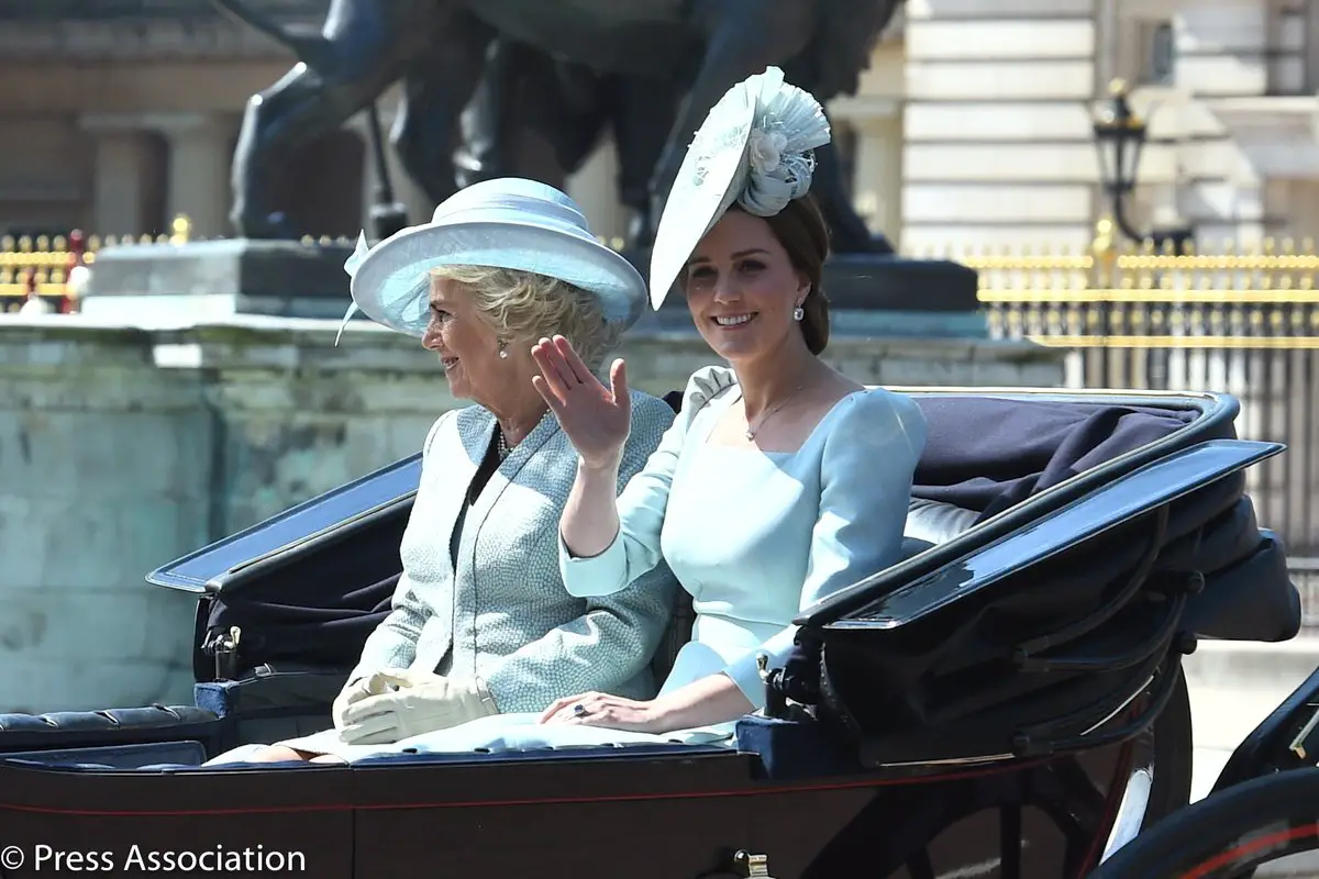 Catherine paired the outfit with a beautiful hat by Juliette Botterill in matching the colour tone.