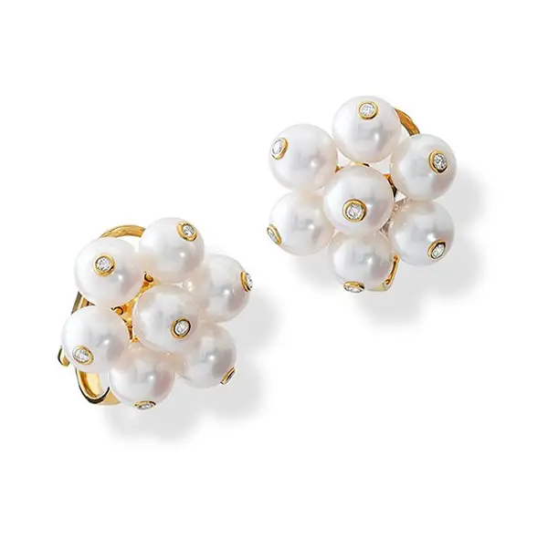 Her Cassandra Goad Cavolfiore Pearl Studs that she first wore at the christening of Prince Louis in July 2018