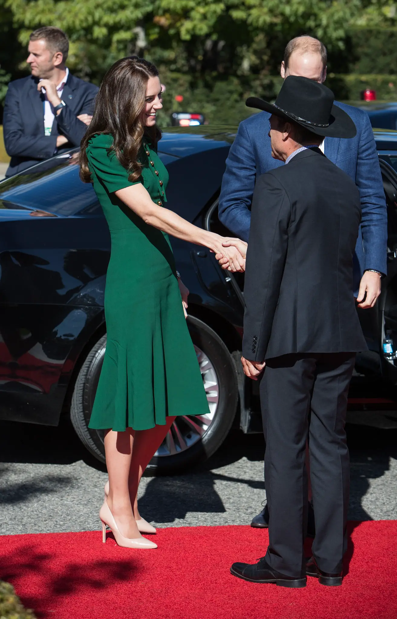 The Duchess of Cambridge in green Dolce and Gabbana dress during kelowna visit in 2016