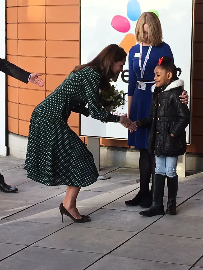 The Duchess of Cambridge in green LK Bennett polka dot dress at Evelina London