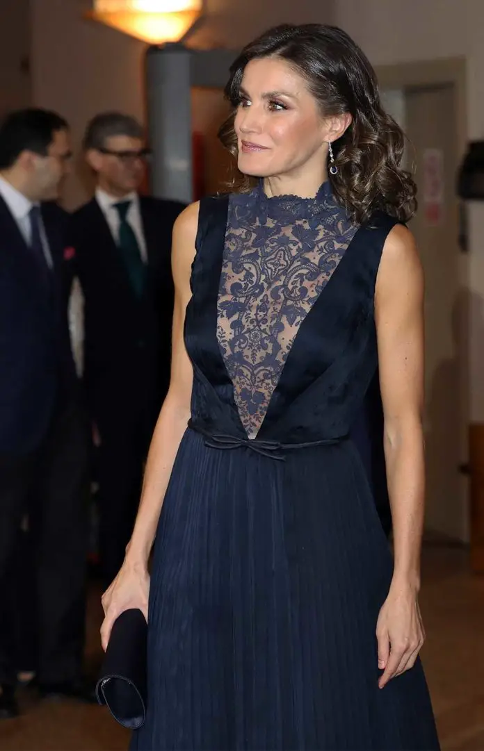 Queen Letizia of Spain wore a satin blue midi dress at Concert for Constitution at 40