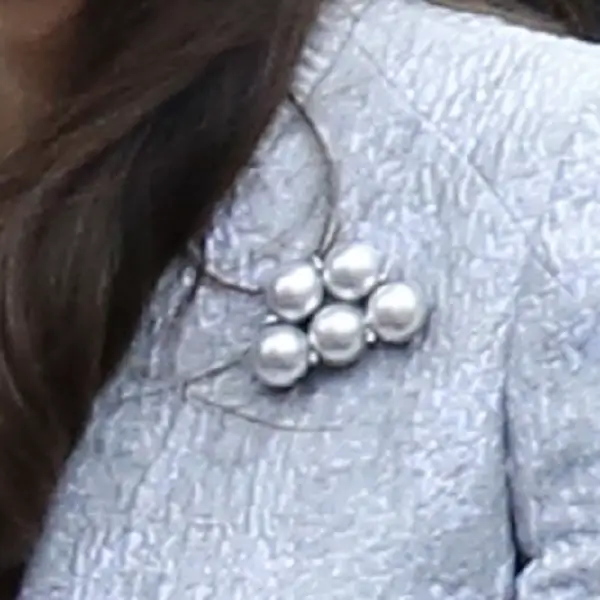 The Duchess of Cambridge was wearing her UFO Five Pearl Brooch