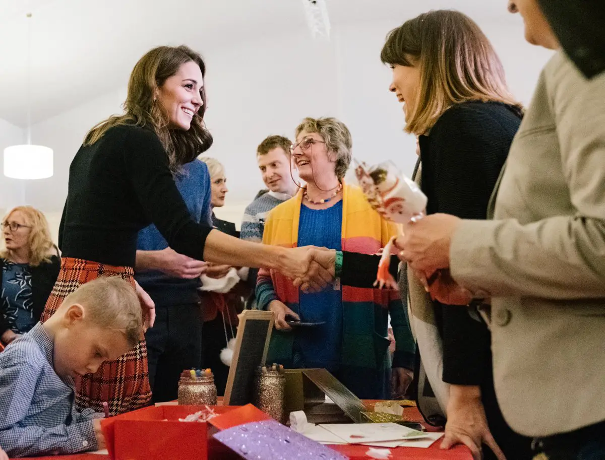 The Duchess of Cambridge meeting with the guests of the Palace Christmas Party