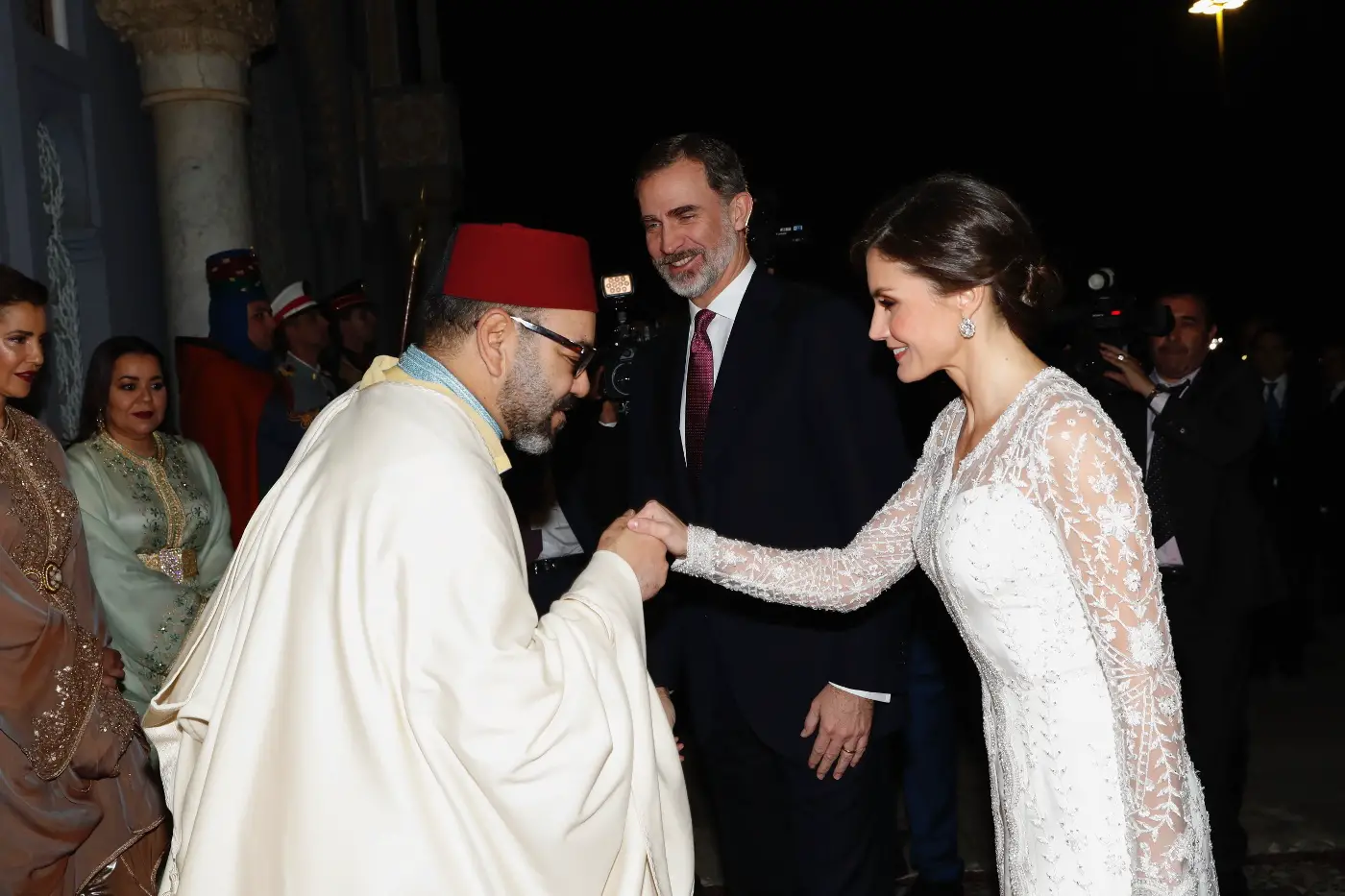Queen Letizia wore white silk gown and floral tunic from Felipe Varela for Gala Dinner in Morocco