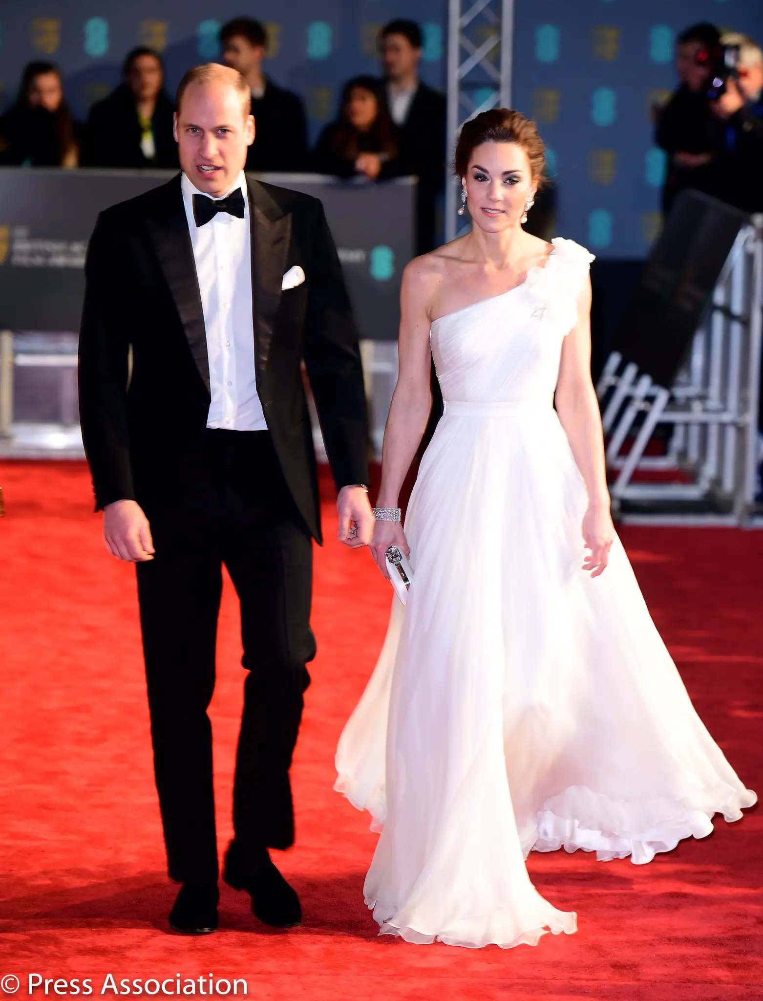 The Duchess of Cambridge wore white off-shoulder Alexander McQueen Gown at BAFTA 2019