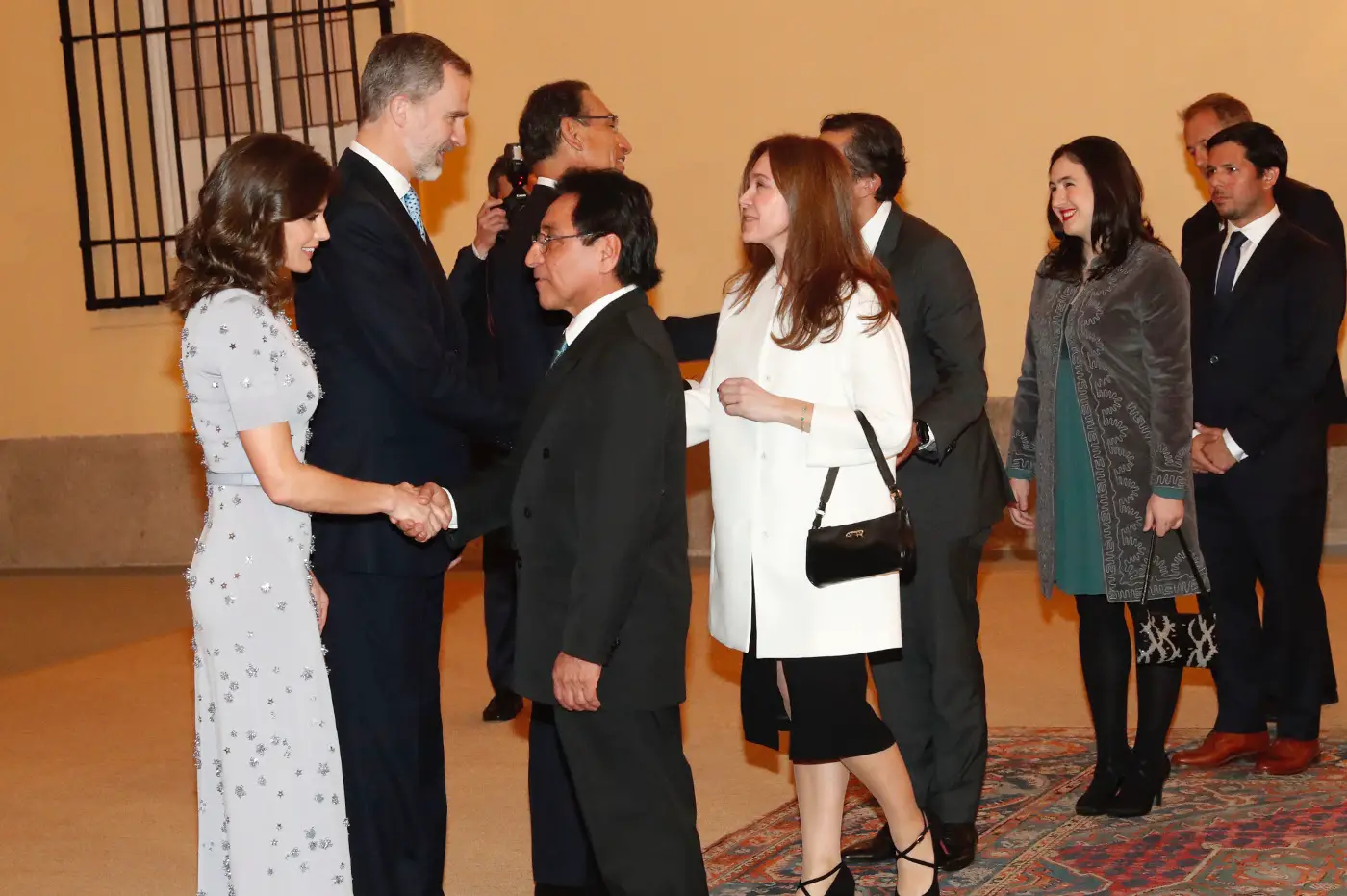 Queen Letizia wore a dove grey cocktail dress by Nina Ricci at the Peru Reception