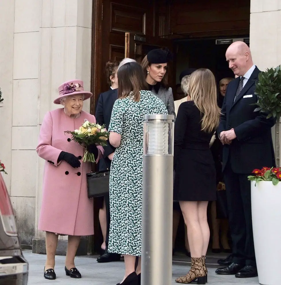 Before leaving the Queen and The Duchess were presented with flowers.