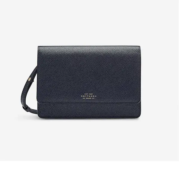 The Duchess of Cambridge was carrying Smythson Panama Clutch