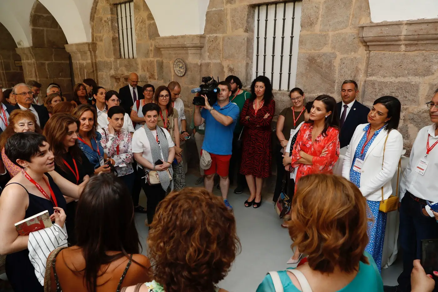 Queen Letizia in red Adolfo Dominguez Floral dress at Seminar Closing in Rioja