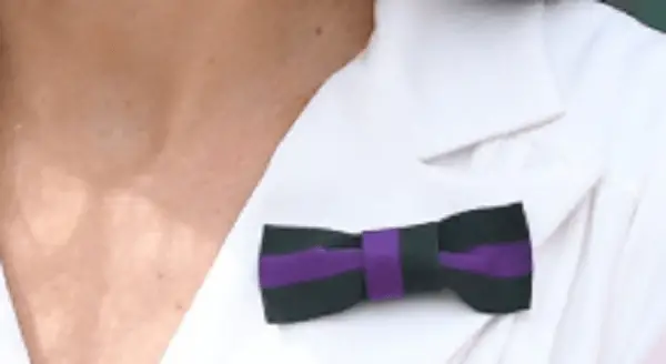 The Duchess of Cambridge wore green and purple wimbledon bow