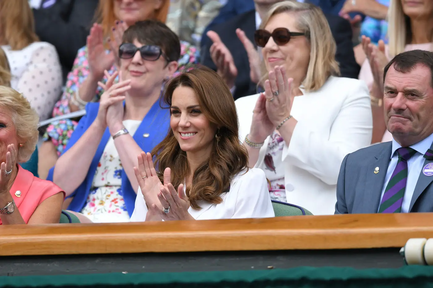 The Duchess of Cambride visited Wimbledon as the patron of the Lawn Tennis wearing white suzannah dress
