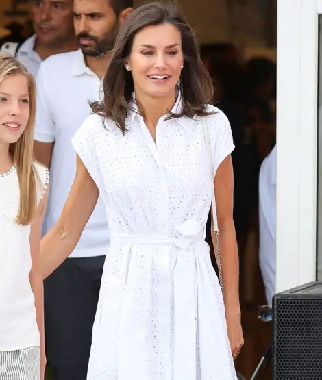 Queen Letizia in white cotton Adolfo Dominguez dress for annual summer vacation photocall at yacht club in mallorca