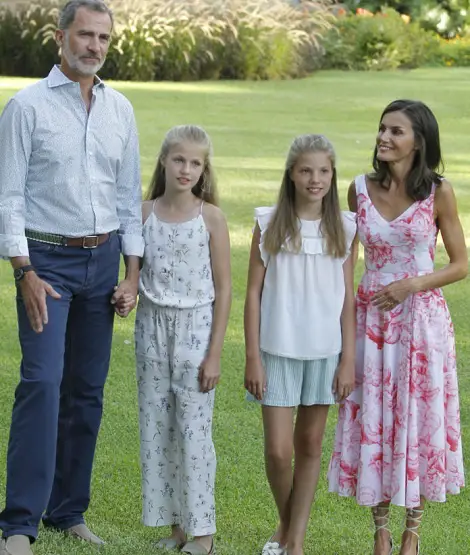 Queen Letizia wore white and pink Adolfo Dominguez dress for annual summer photocall