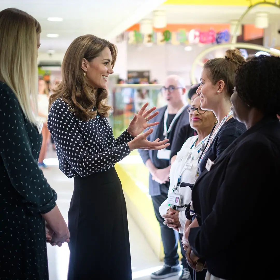 Duchess of Cambridge wore blue polka dot shirt and Zara Culottes to Sunshine Family Nursing Programme