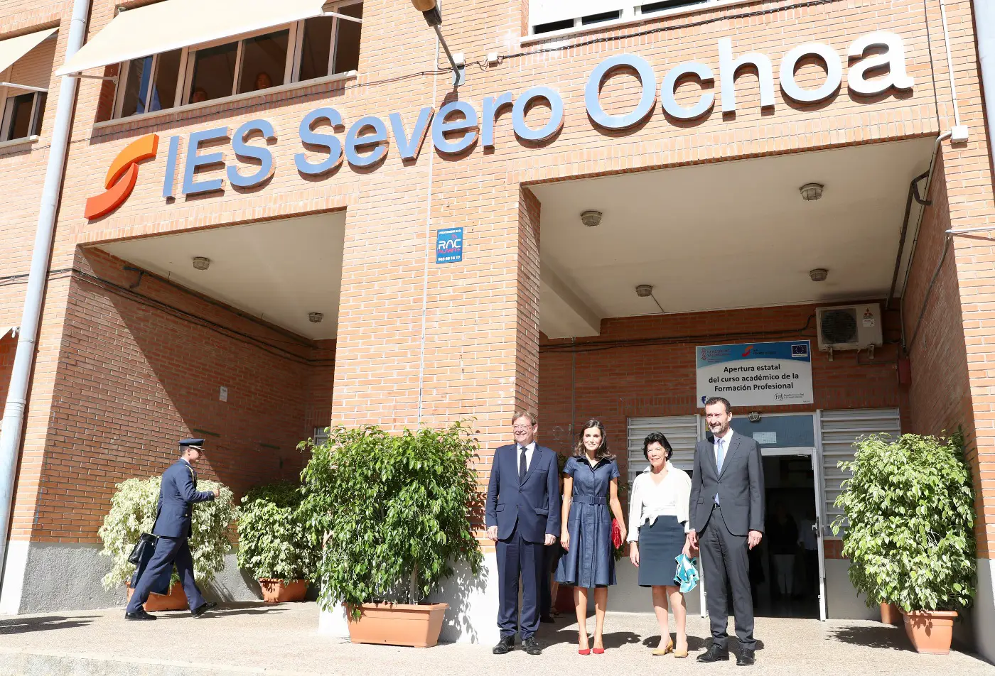 Queen Letizia in Carolina Herrera Denim Shirt Dress to open Vocational Course