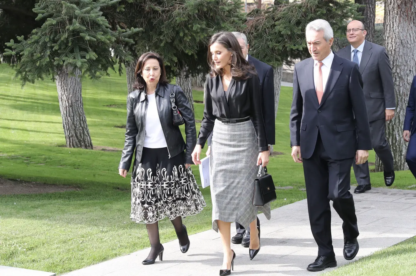 Queen Letizia of Spain presented friendship awards wearing black blouse and gray skirt