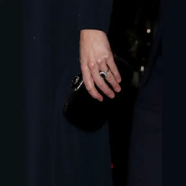 Duchess of Cambridge carried a new black Alexander McQueen Clutch at the festival of remembrance