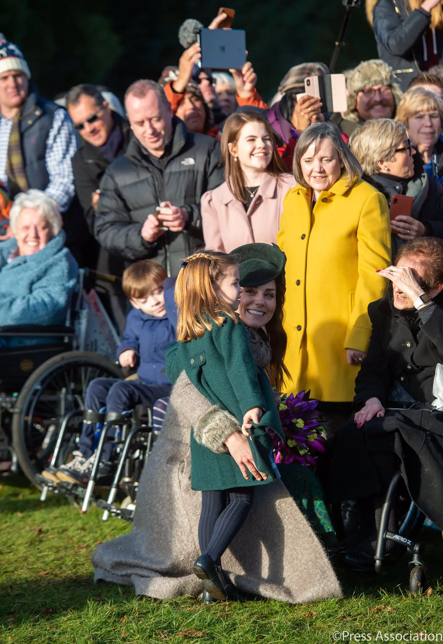 The Duchess of Cambridge with Princess Charlotte during Christmas Walkabout