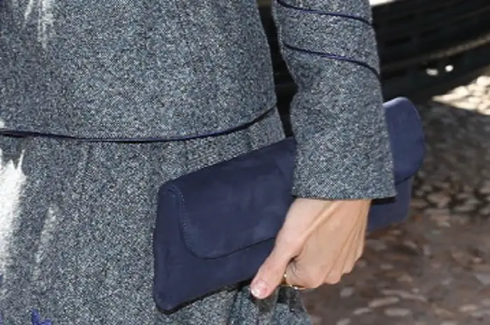 Queen Letizia carried Navy suede Magrit Clutch