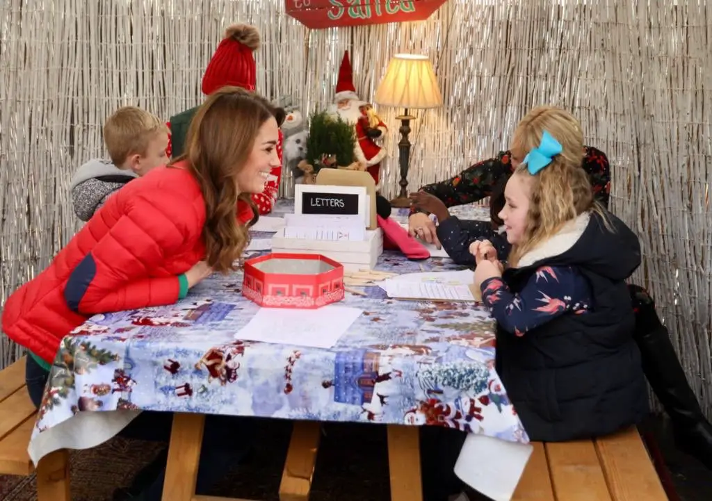 The Duchess of Cambridge participated in Christmas activities with children during a visit to Family Action
