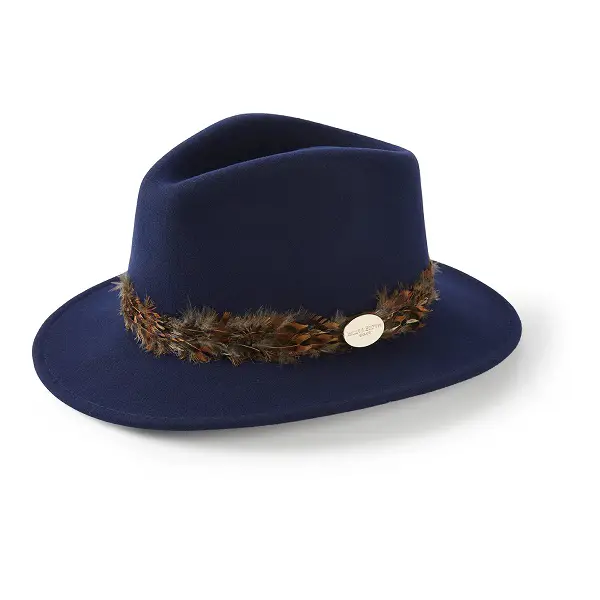 The Duchess of Cambridge wore Hicks and Brown The Suffolk Fedora in Navy (Pheasant Feather Wrap) at the Sunday Church Service in January 2020