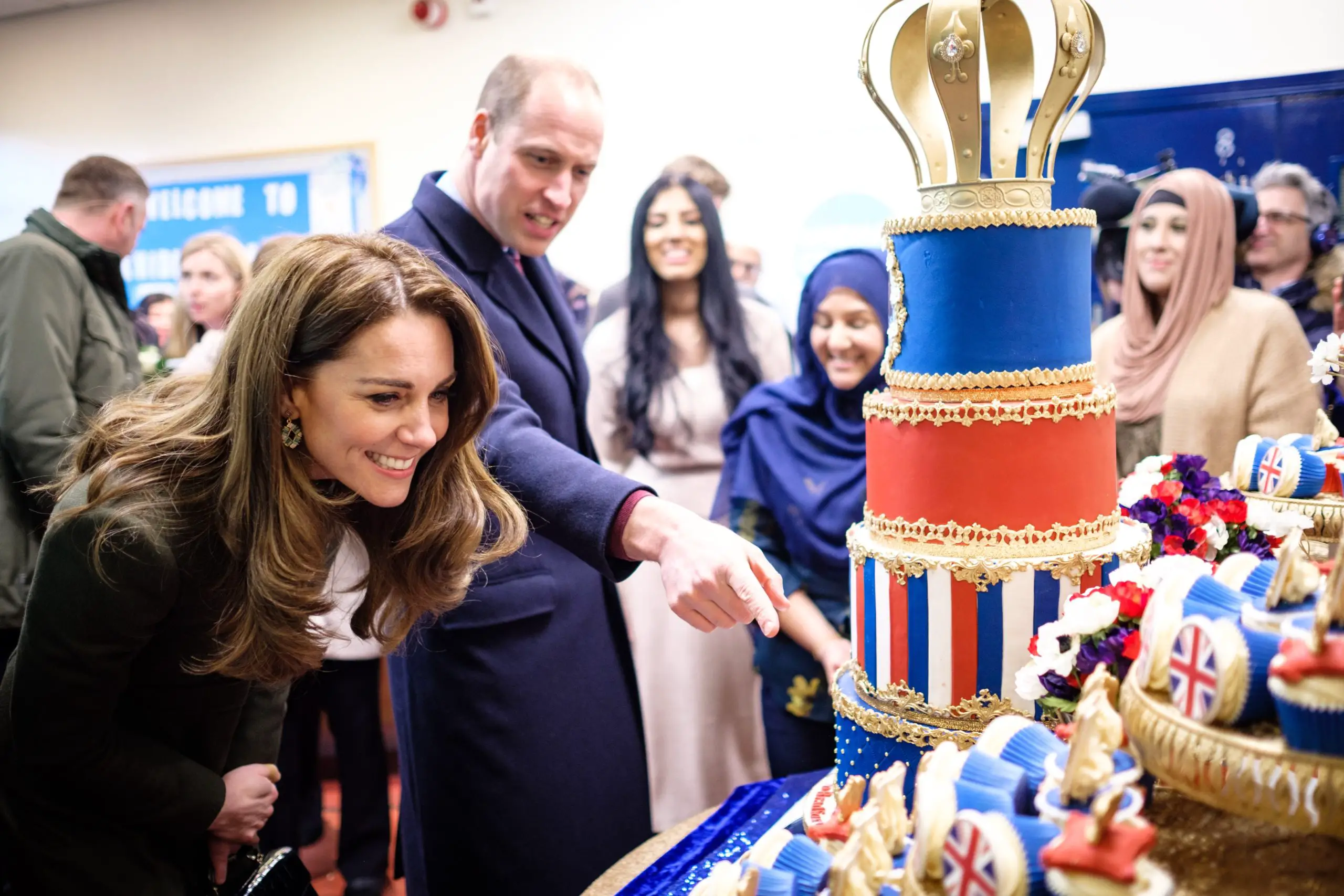 The Duke and Duchess of Cambridge presented with a colourful 'William and Kate' Cake during a visit to Bradford