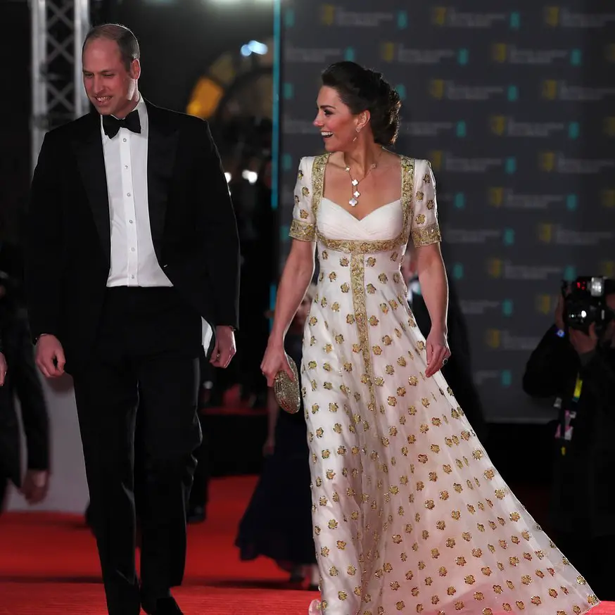 The Duchess of Cambridge whore white and gold Alexander McQueen gown at 2020 BAFTA