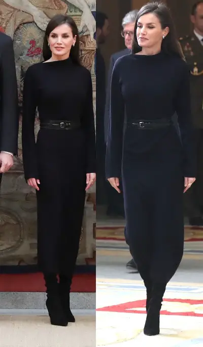 Queen cuts an elegant figure at the event in a black midi dress. She wore COS black wool dress