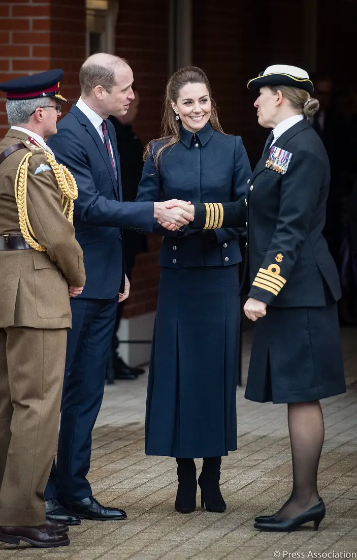 The Duchess of Cambridge wore Alexander McQueen skirt suit for a joint engagement with Prince Charles and Duchess Camilla