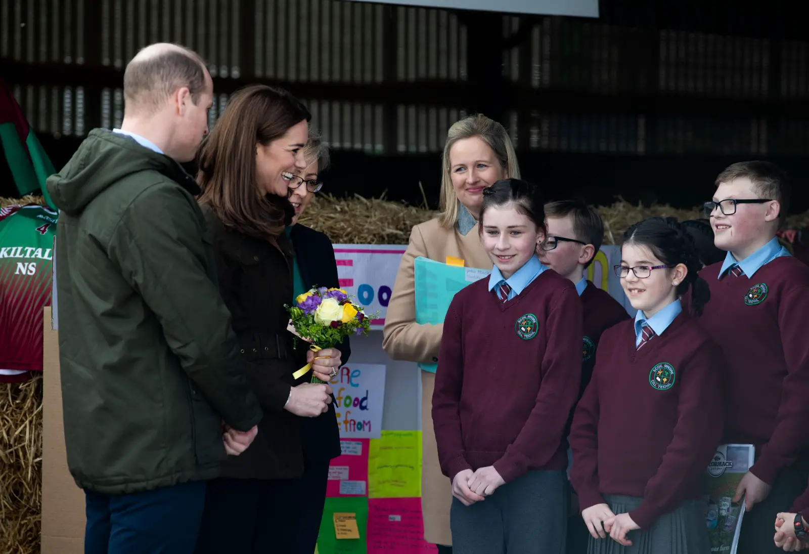 During the farm visit, the royal couple was joined by a group of school children who welcomed the Duchess with a posy.