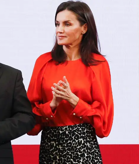 Queen Letizia wore orange Zara blouse and Roberto Vernio skirt at Palace event