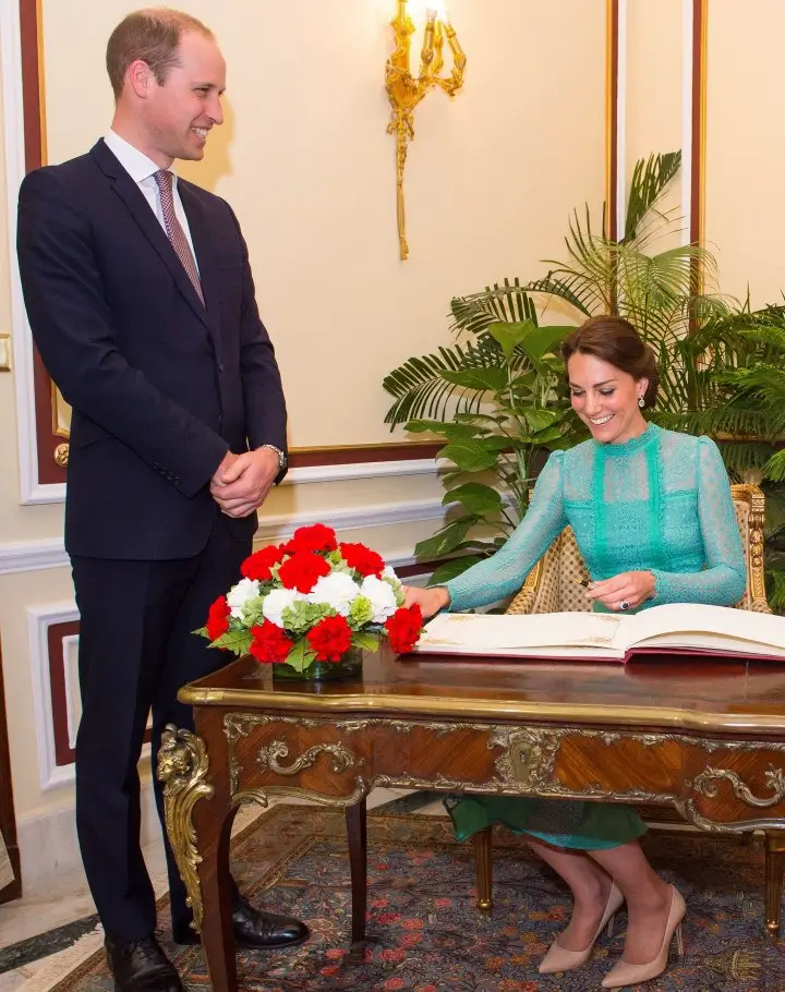 The Duchess of Cambridge signing visitor's book at Hyderabad House