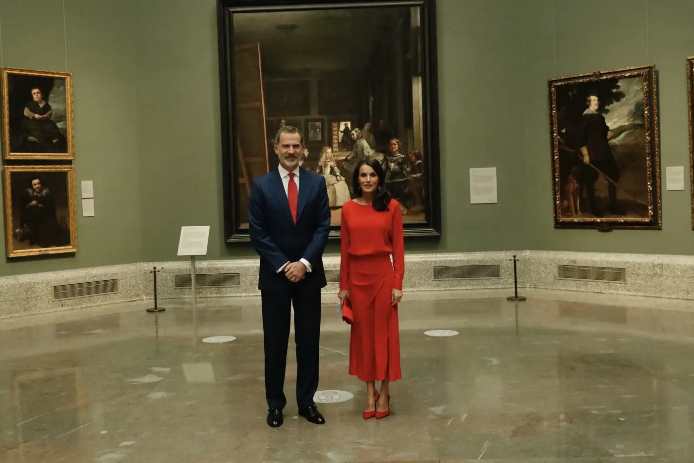King Felipe and Queen Letizia of Spain photographer at the Prado Museum with Las Meninas by Velázquez in the background