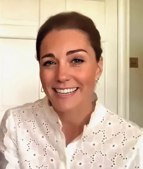 The Duchess of Cambridge wore white Mabel MIH Shirt and Accessorize earrings for the volunteer week zoom call