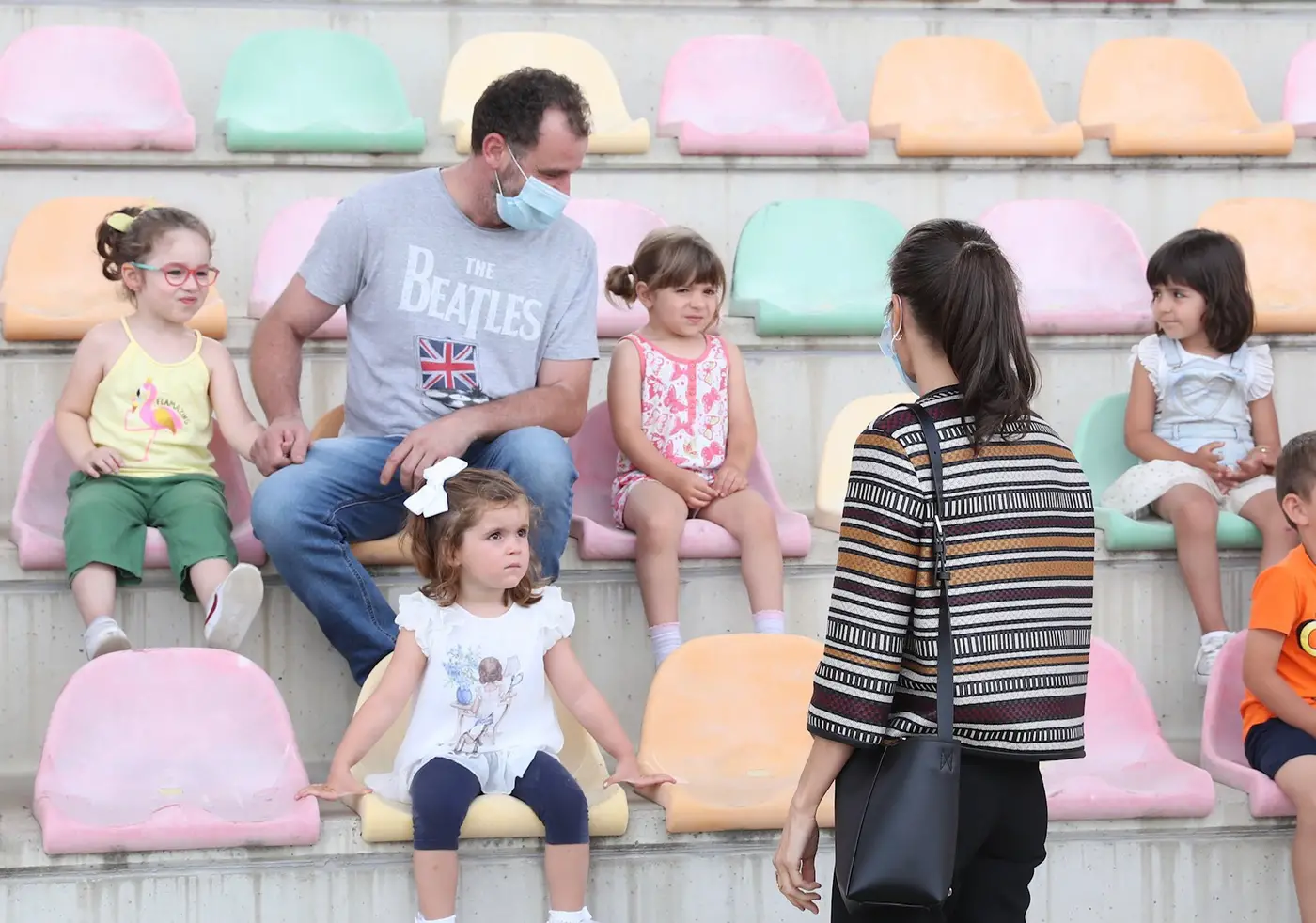 Queen Letizia of Spain saying hello to kids at Haro Stadium