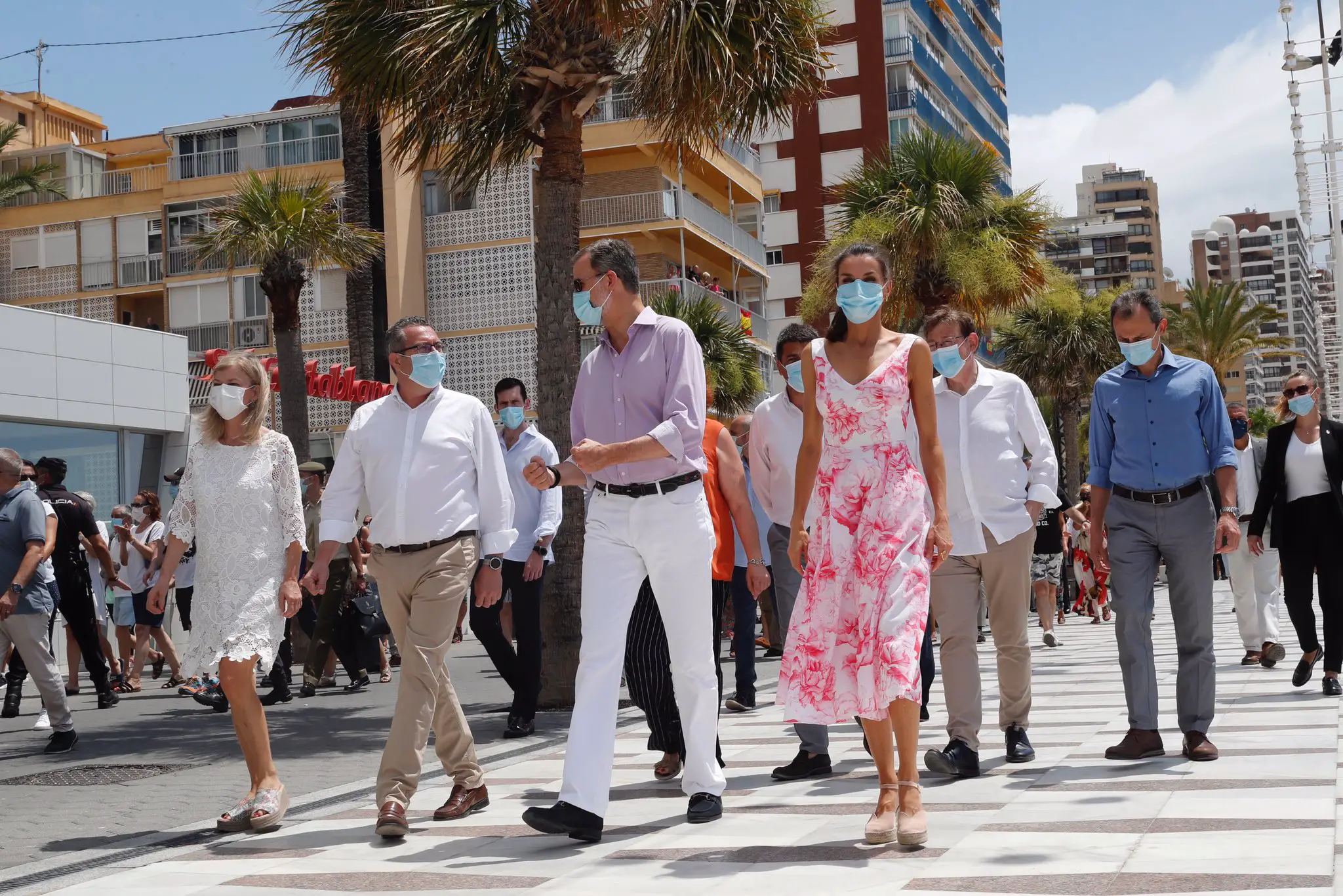 Queen Letizia wore white and pink adolfo dominguez dress to visit benidrom and valencia