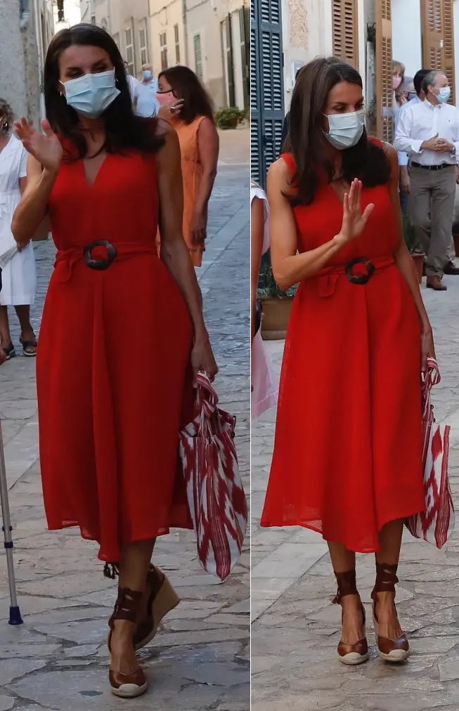 Queen Letizia of Spain chose a red Adolfo Dominguez dress with uterque wedges in Mallorca day out