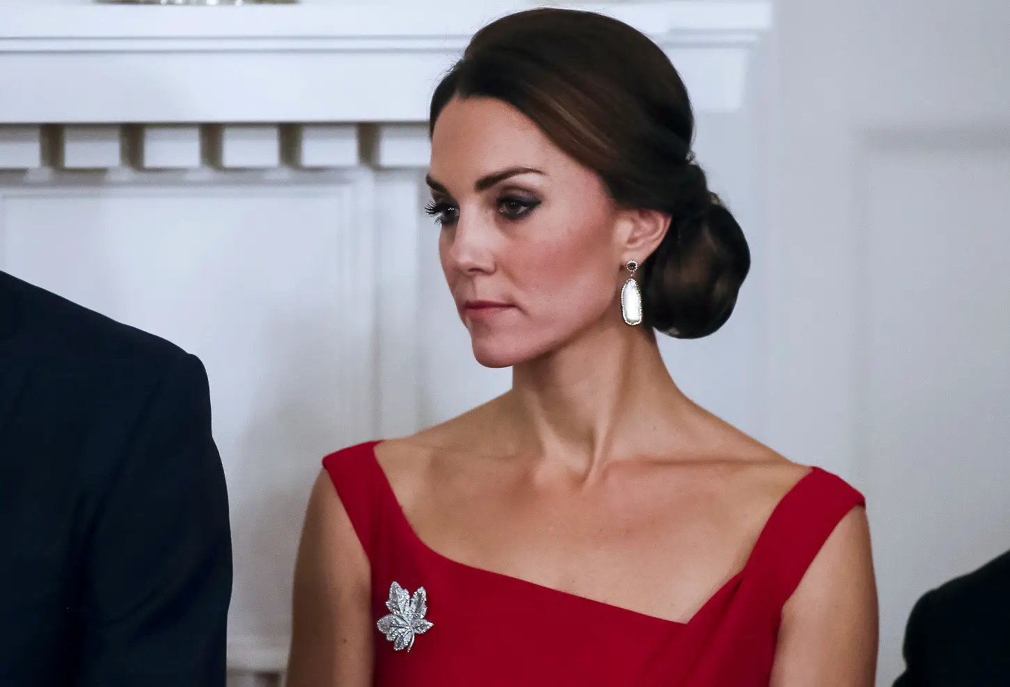 The Duchess of Cambridge looked stylish and elegant in red Preen by Thornton Bregazzi Finella Satin Midi Dress and Sory earrings at black rod ceremony in Canada
