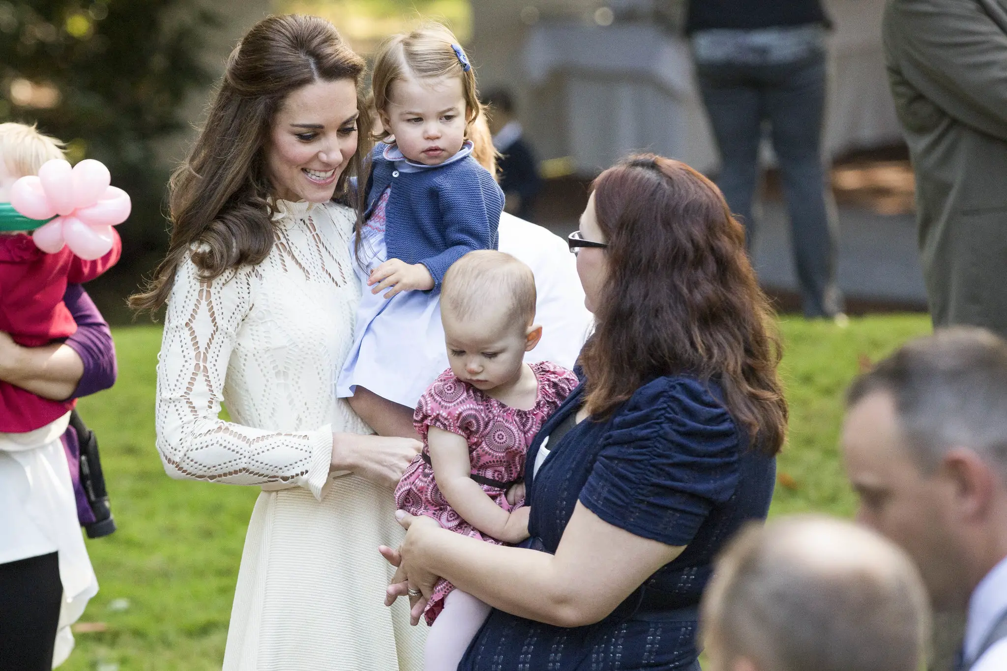 The Duchess of Cambridge talking to a mother