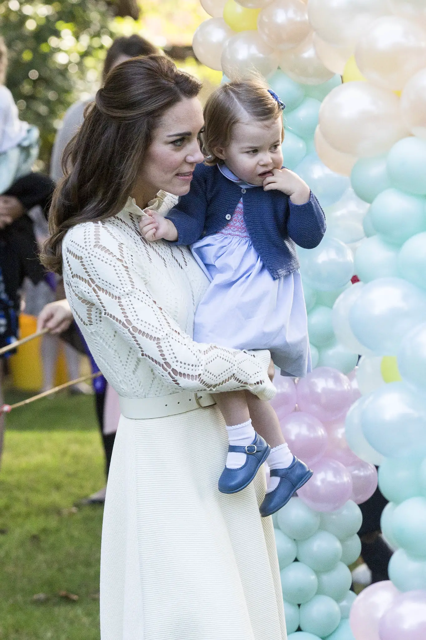 The Duchess of Cambridge with Princess Charlotte at the tea party in Canada